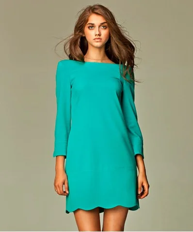 Mod dress style, but would be solid black, more cinched in at the waist, and would have pockets with yellow flaps. Also the hem would be straight like the picture to the right.