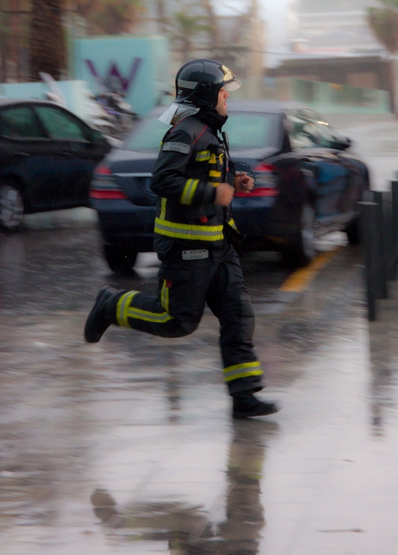 This photo was taken during the biggest storm to hit Barcelona in 50 years. This fireman was on his way to rescue one of his colleagues who had been washed out to sea. Thankfully he was saved, but I wouldn't have captured this type of image if I had retreated back inside when the storm hit.