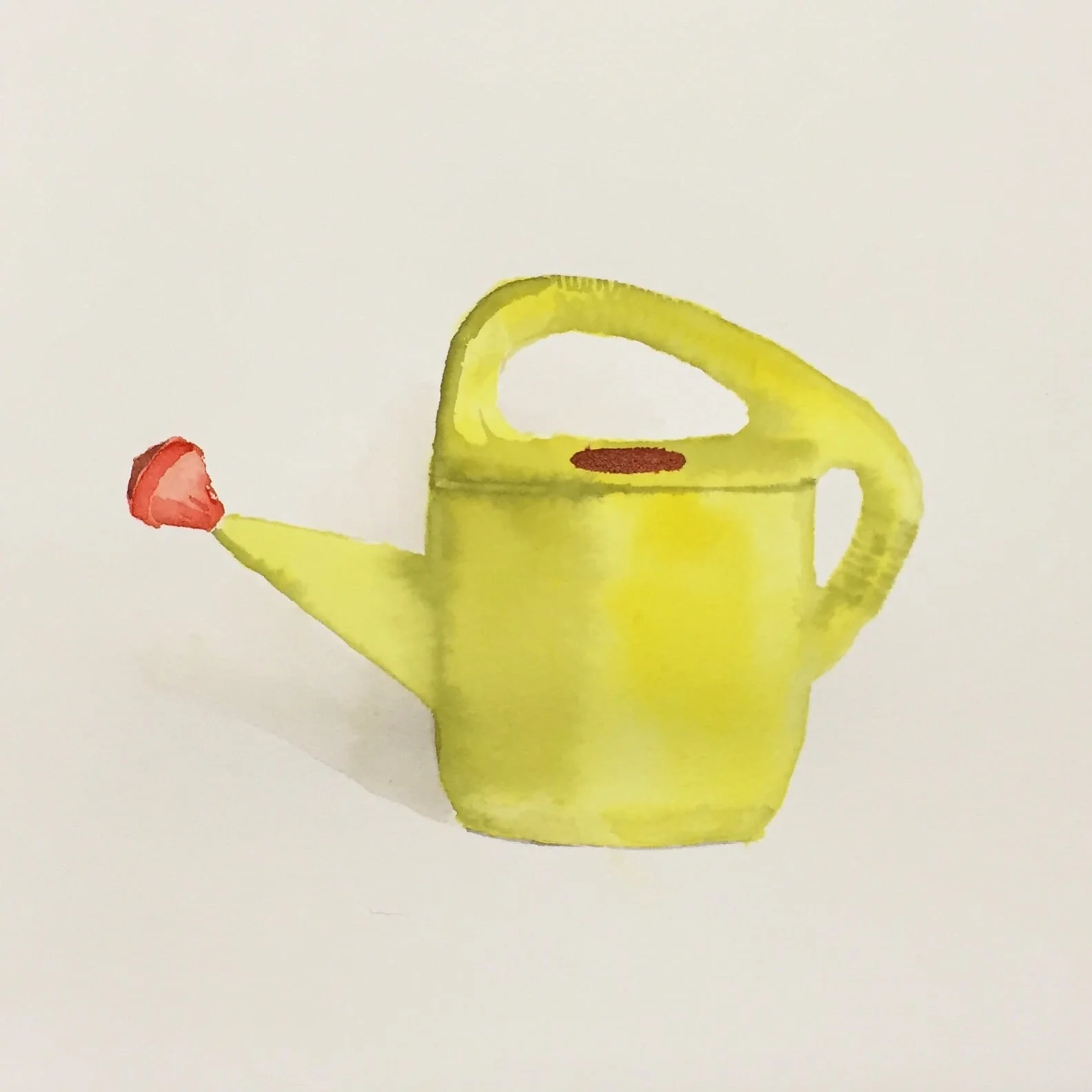 yellow plastic watering can