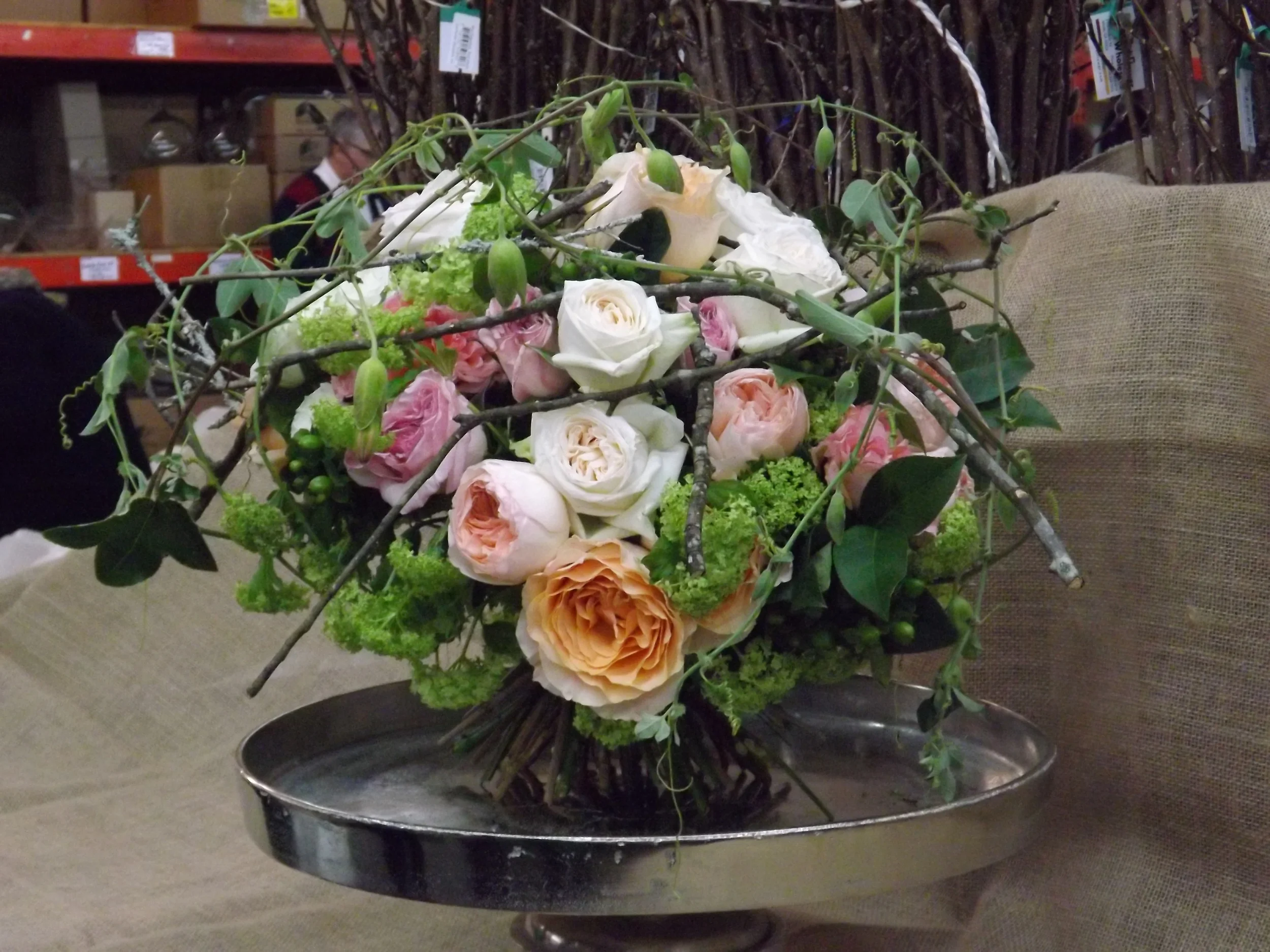 I liked his technique for wiring sticks to lay over top of bouquet.