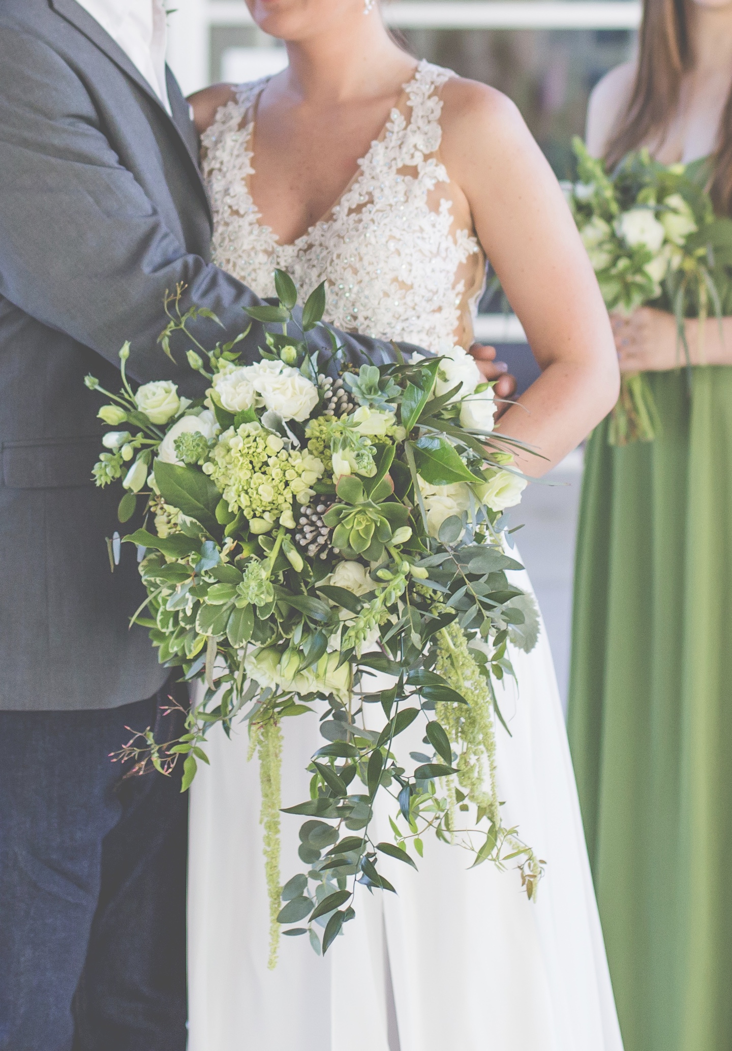 Wild Garden, Draping Greenery Style with Succulents, Amaranthus, Lisianthus and Hydrangea. Photo by New View Photography. 2 on the Roof, Chattanooga TN.