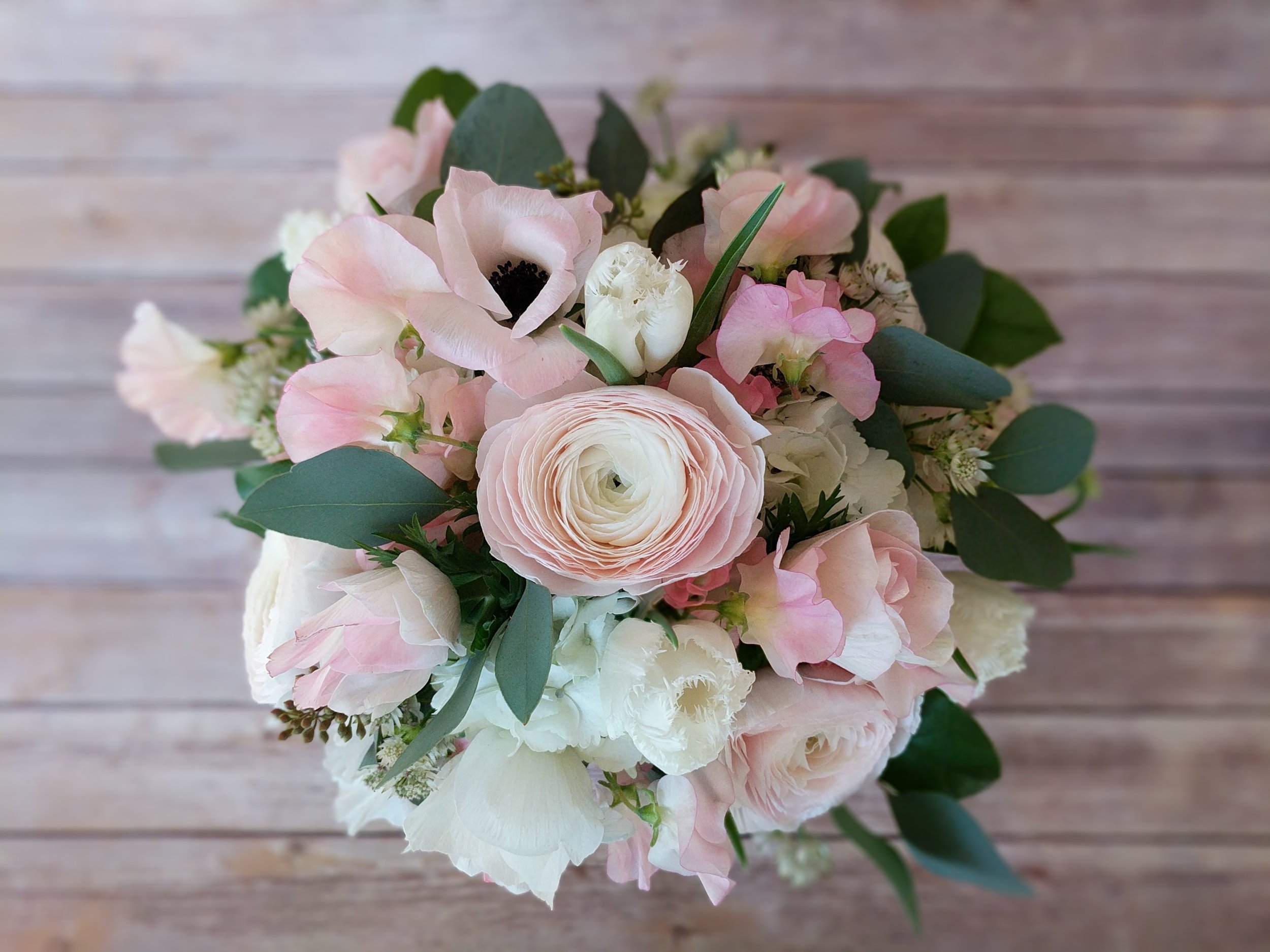 Shades of soft pink with ivory and dusty blue
