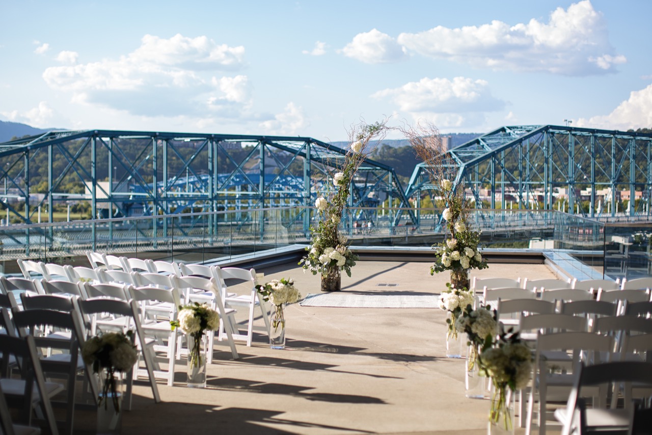 Willow Arch with Hydrangea and greenery aisle markers
