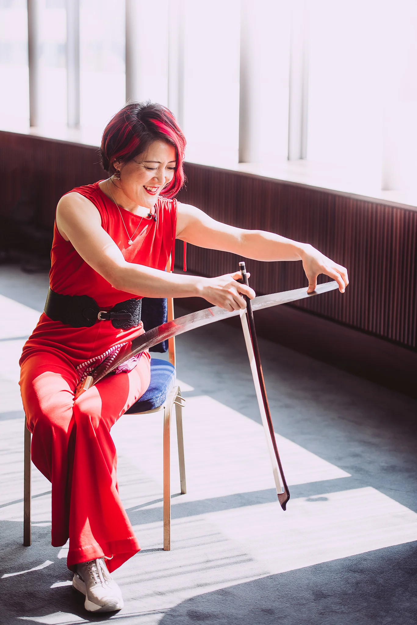 33 SCO cellist Su-a Lee plays her musical saw during an interview with STV.jpg