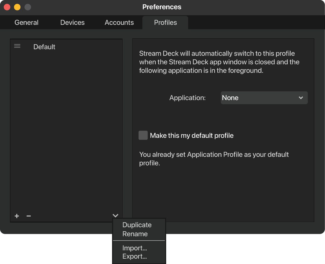 Screenshot of a computer settings window titled Preferences with tabs General, Devices, Accounts, and Profiles. The Profiles tab is open, showing options for stream deck profile preferences, including a dropdown menu labeled Application set to None, a checkbox for making the profile default, and a note indicating an application profile is already set as default. There are options to add, remove, and access a menu for duplicate, rename, import, and export.