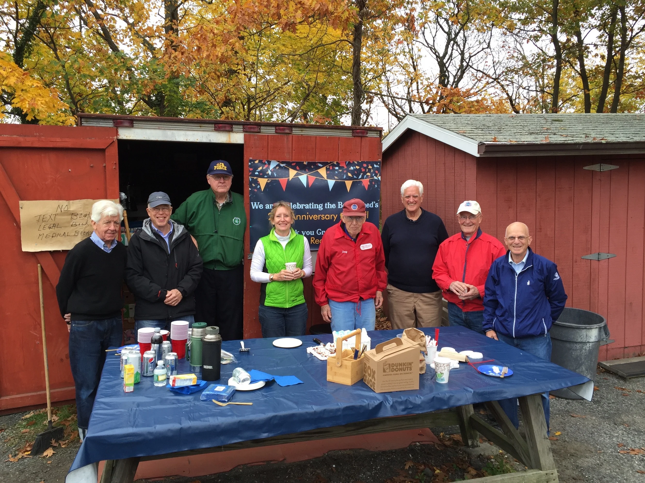 Lorrie Stapleton and Doug Francefort with the volunteers at the Greenwich Book Shed