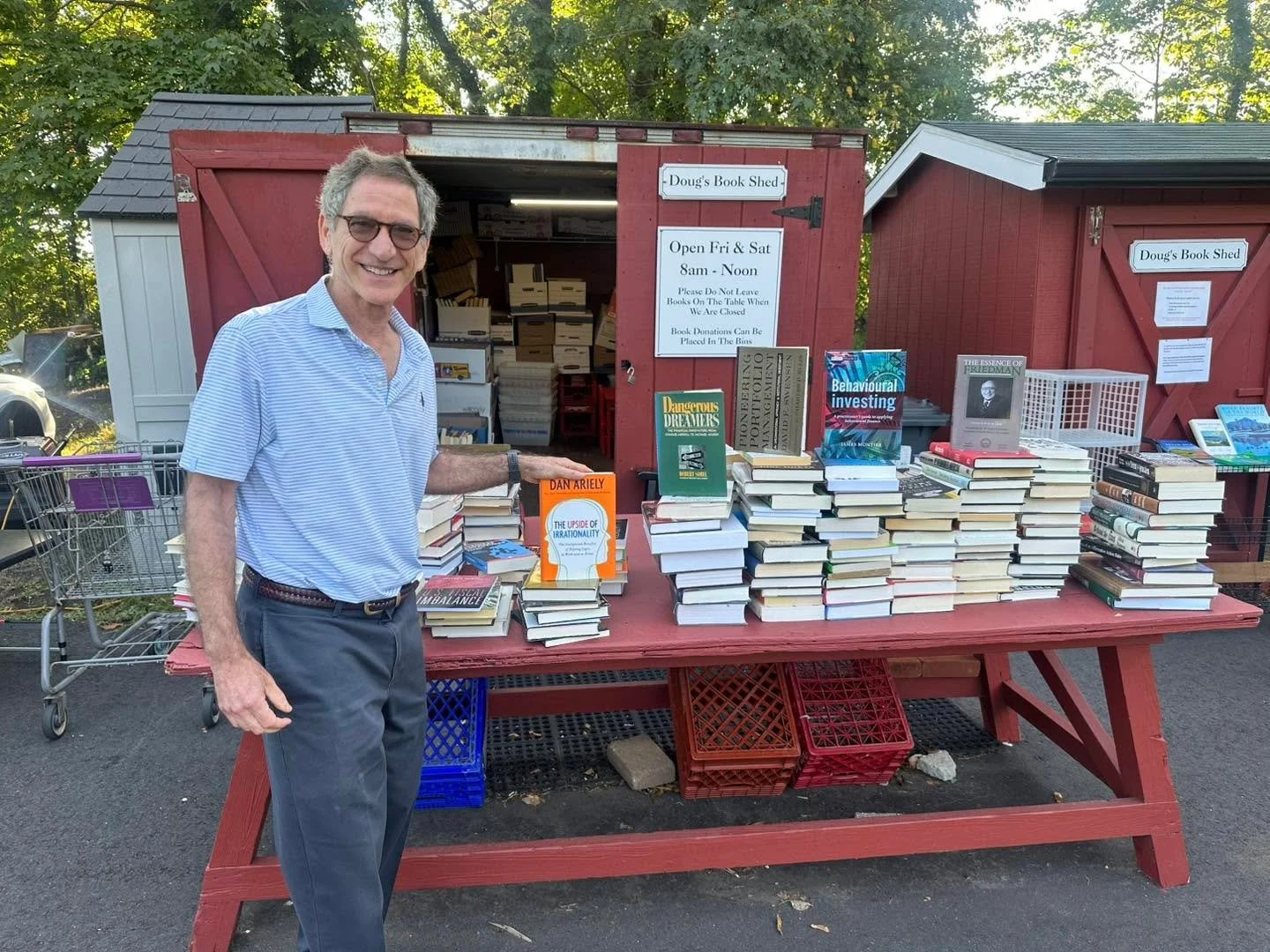 Larry dropping off an enormous collection of non-fiction books! 

Come and find a new treasure!