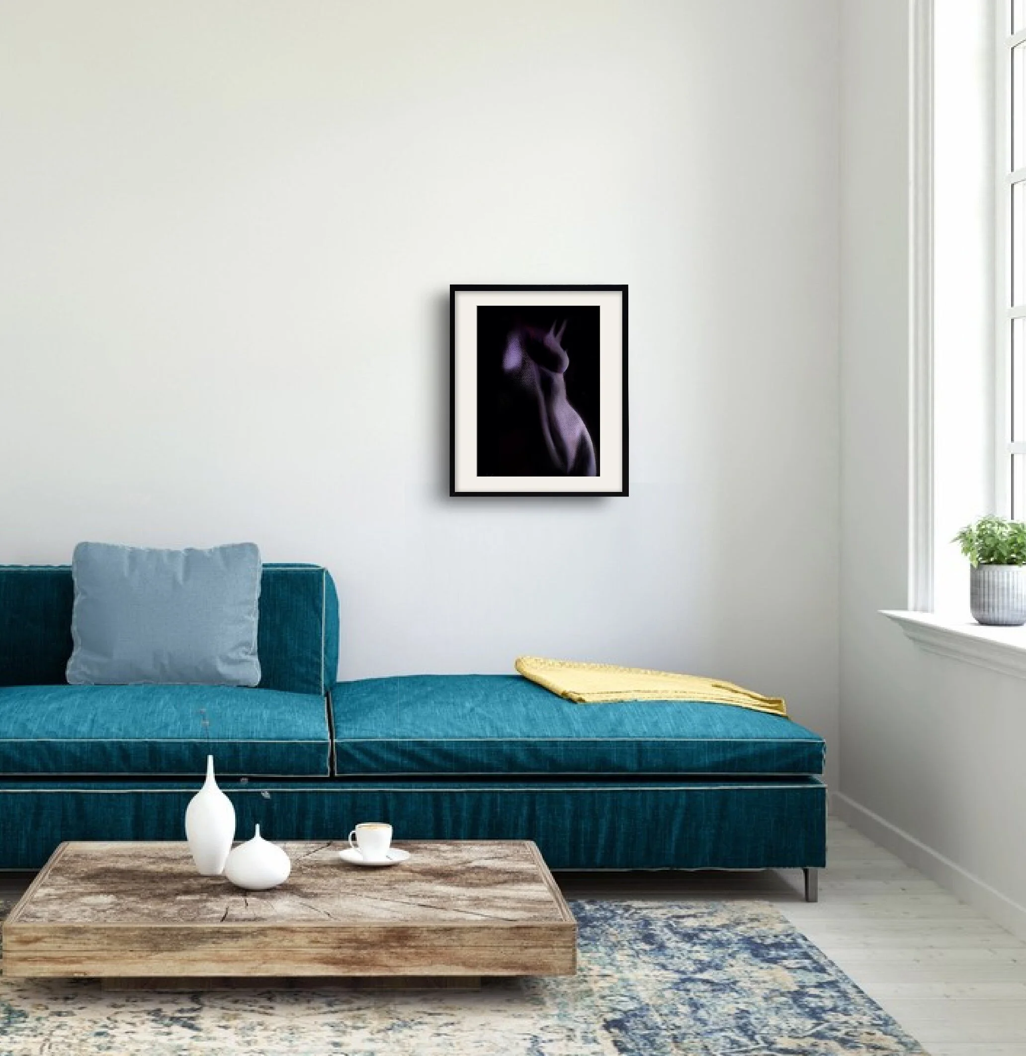 Framed paper print of Torso on a wall