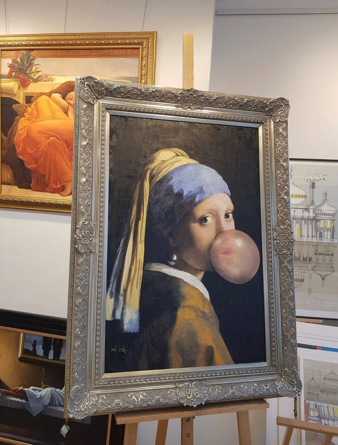 Bubble in ornate silver frame.