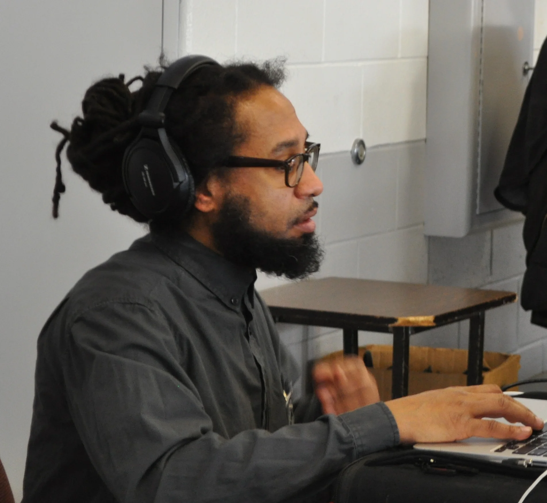 Candid shot of Doc Israel working on the music during a recording session