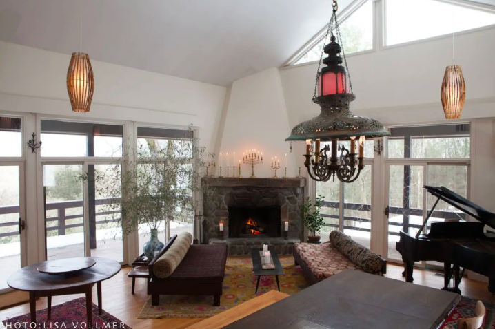 The view from the dining room table into the living room