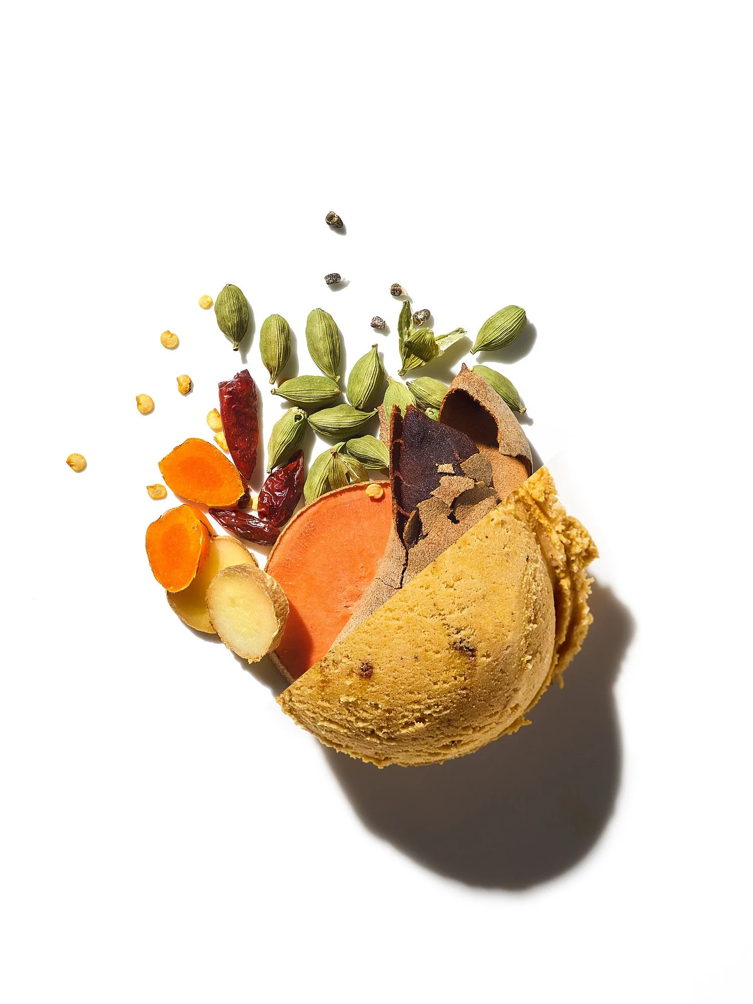 Elaka Treats sweet potato flavor explosion conceptual food advertising photography for Lexington Candy Our State Magazine by Dhanraj Emanuel, editorial food photographer NC