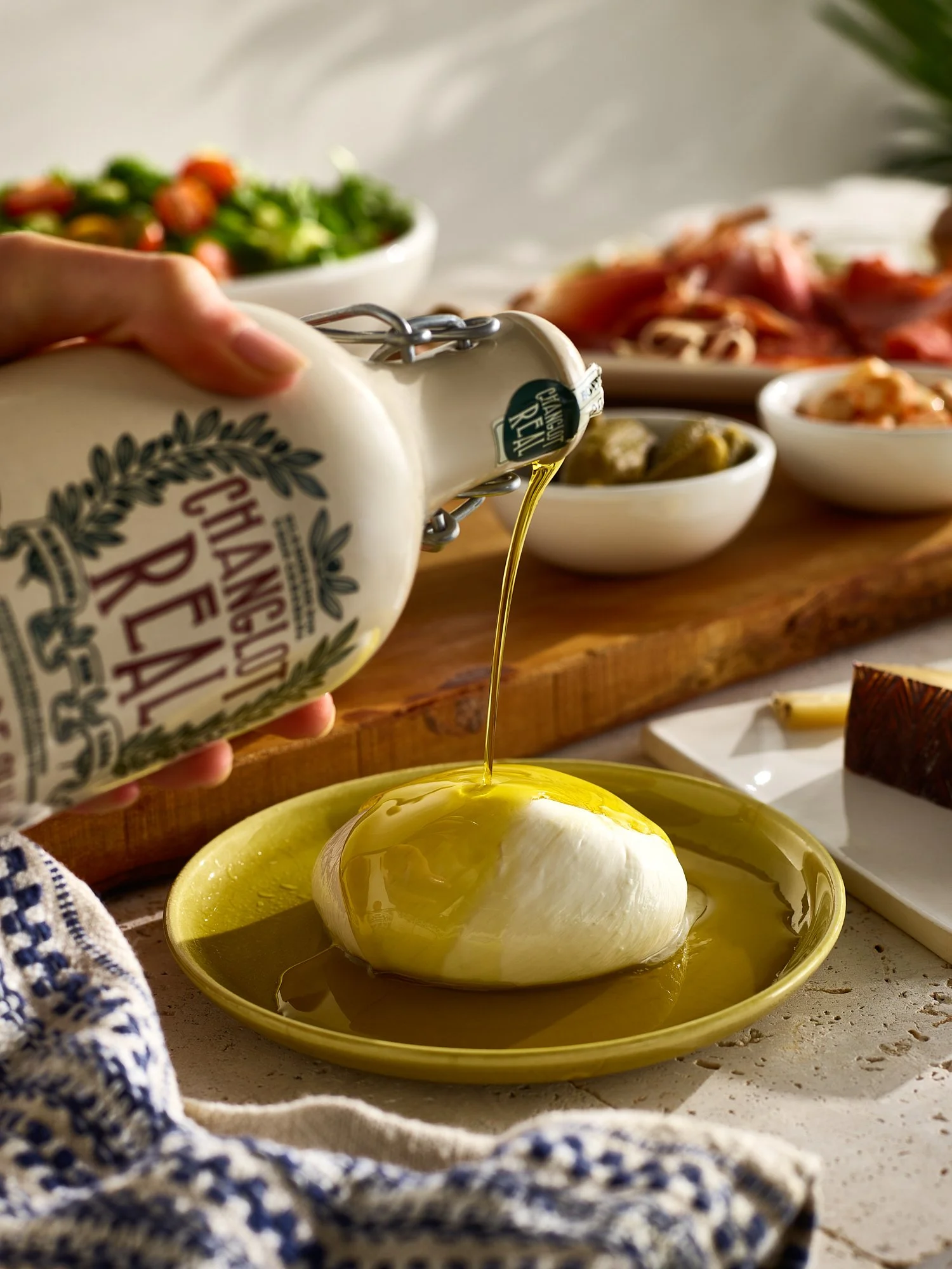changlot-real-olive-oil-poured-over-mozzarella.jpg