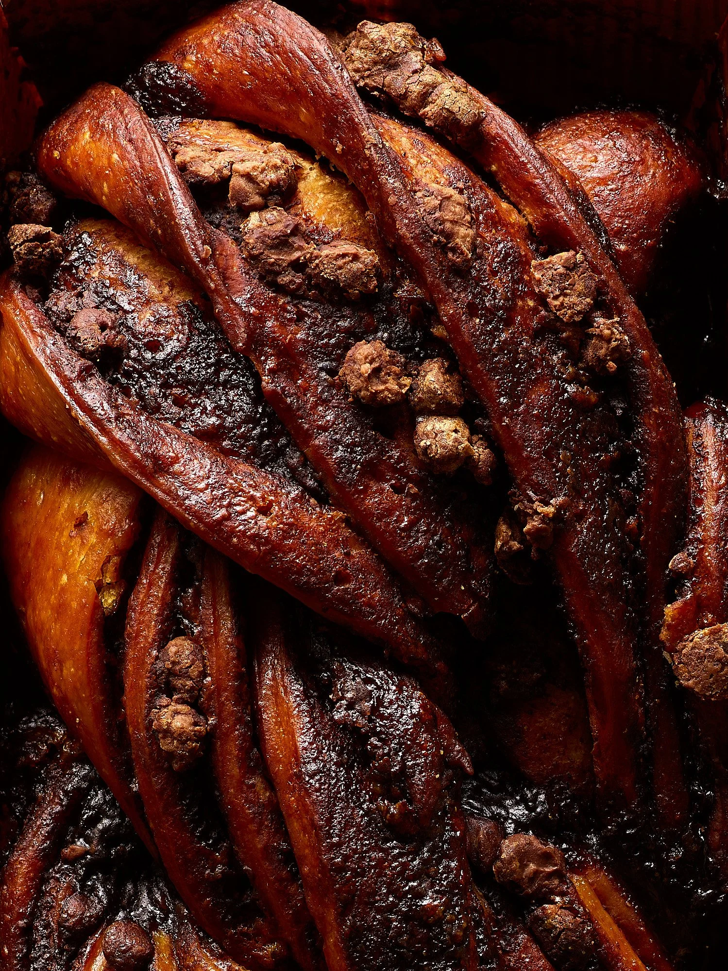 Dark dramatic babka bread advertising photography by Dhanraj Emanuel, studio food photographer Greensboro NC
