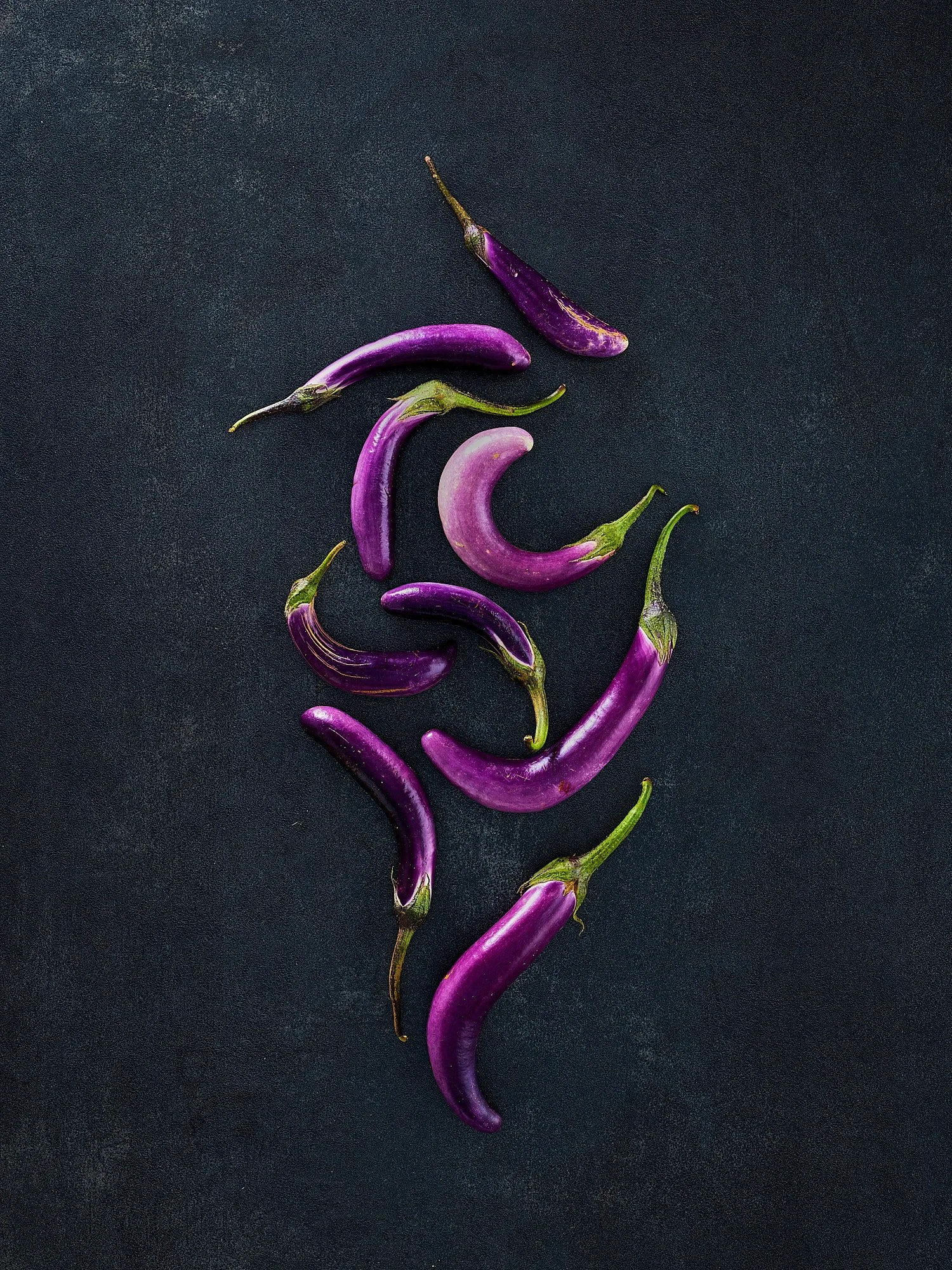 Purple Japanese eggplant dark dramatic overhead fine art editorial food advertising photography by Dhanraj Emanuel, CPG food photographer Greensboro NC