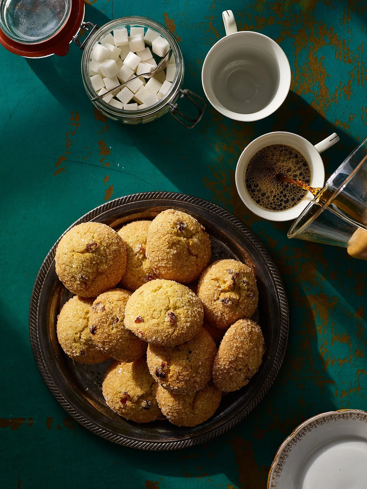 Cranberry scones Costco dark teal overhead food advertising photography by Dhanraj Emanuel, CPG food photographer Greensboro NC
