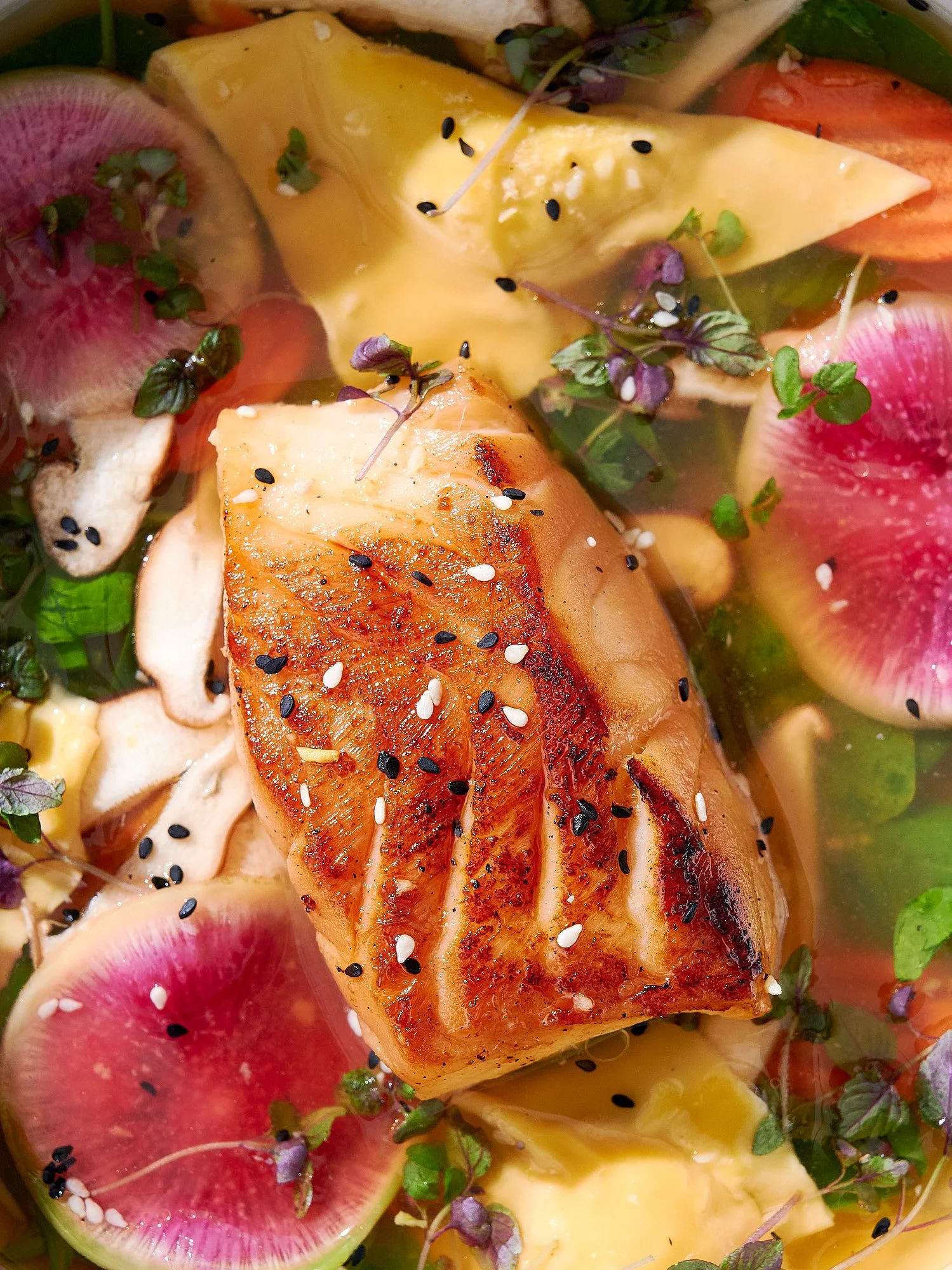 Seared salmon with watermelon radish broth restaurant food photography for White and Wood by Dhanraj Emanuel, restaurant photographer Greensboro NC