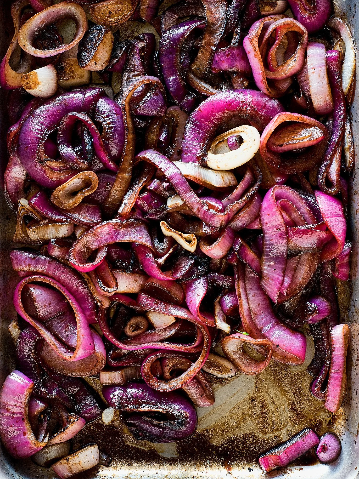 Roasted red onions dark overhead food advertising photography by Dhanraj Emanuel, editorial food photographer NC