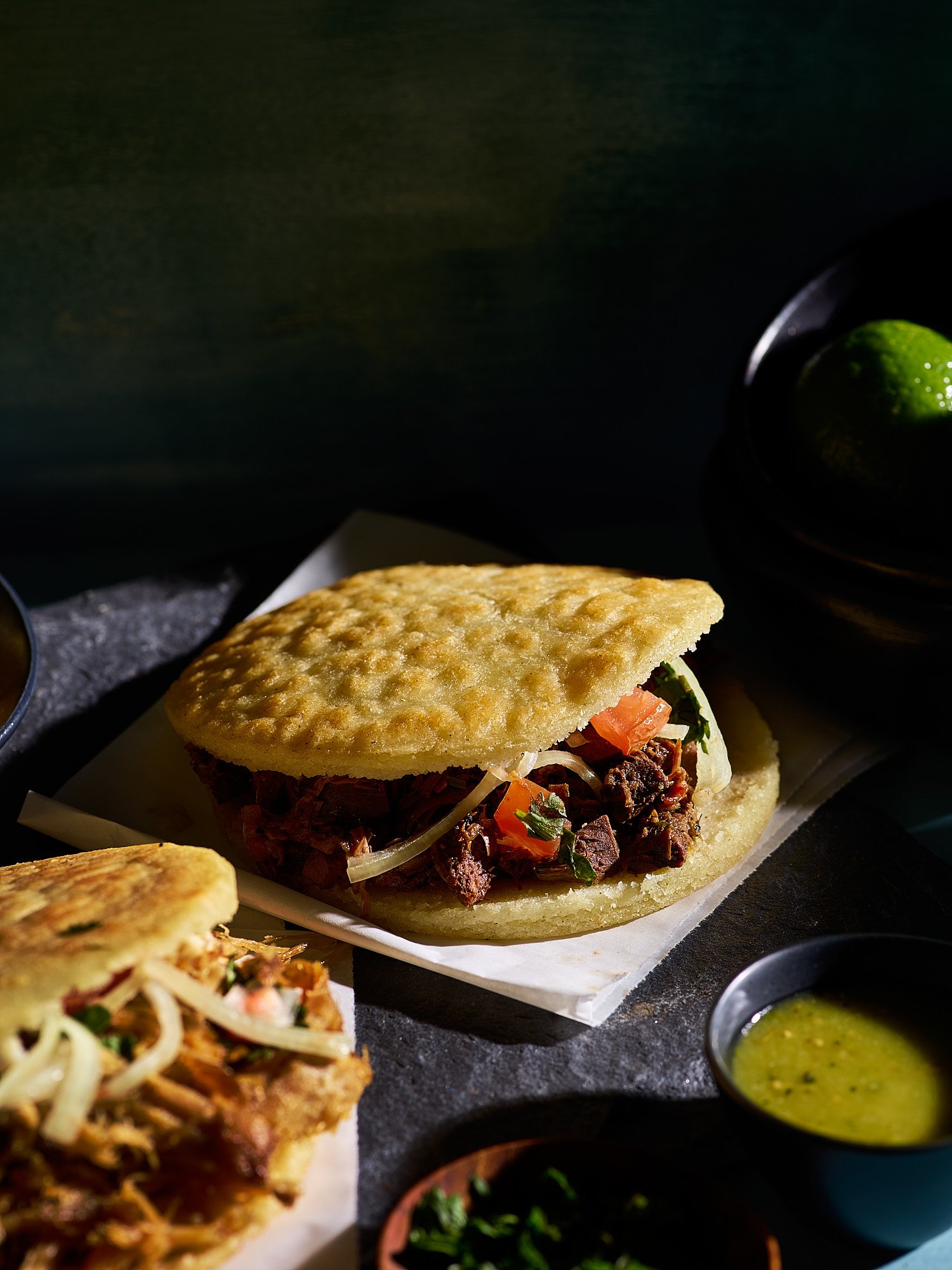 ETHNOSH Que Viva arepa dark dramatic food advertising photography by Dhanraj Emanuel, CPG food photographer Greensboro NC