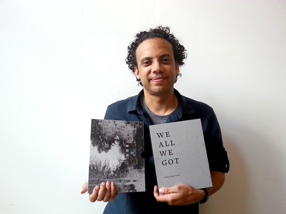 Carlos with book small.jpg