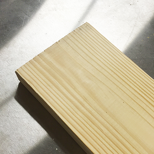 A fresh clean pine board, ready to get slapped.