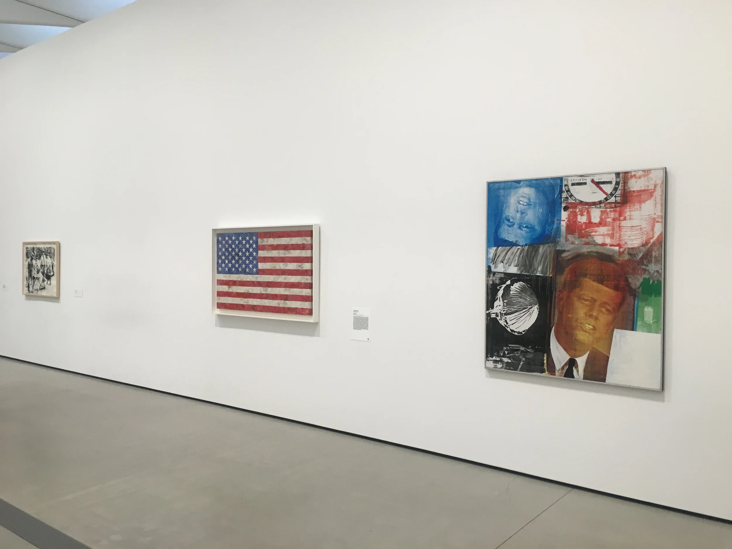 Andy Warhol Race Riot 1963, Jasper Johns Flag 1967, and Robert Rauschenberg's Untitled 1963.