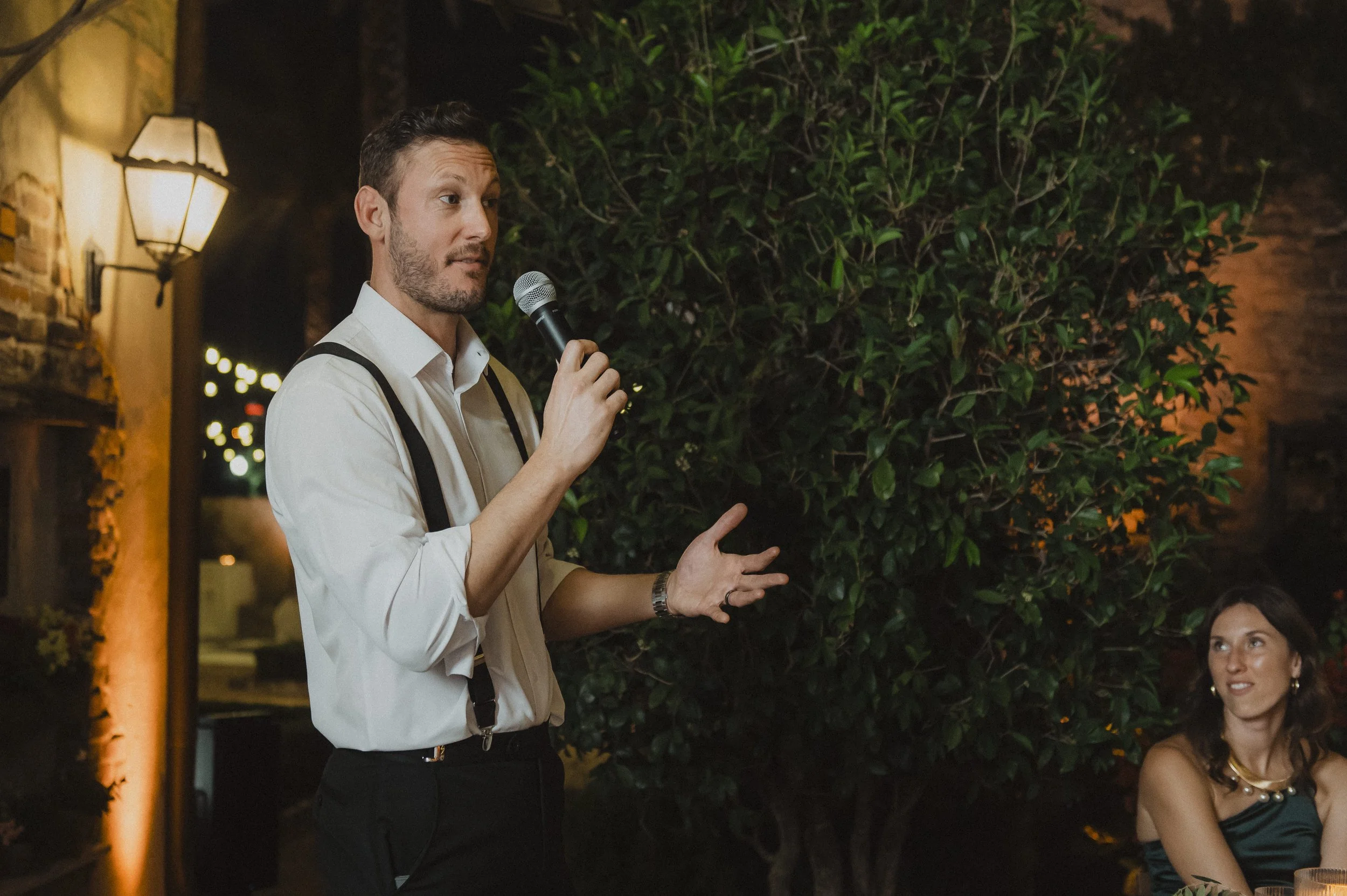 Groom giving a speech during a Race + Religious wedding reception
