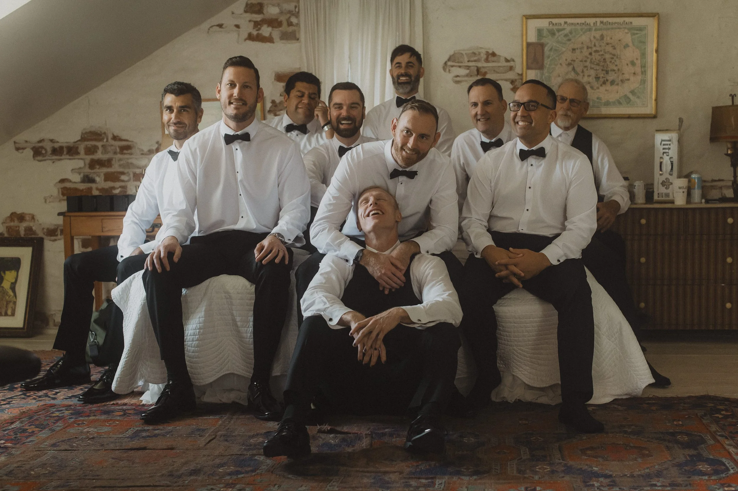 Groom and groomsmen gathered together before the wedding