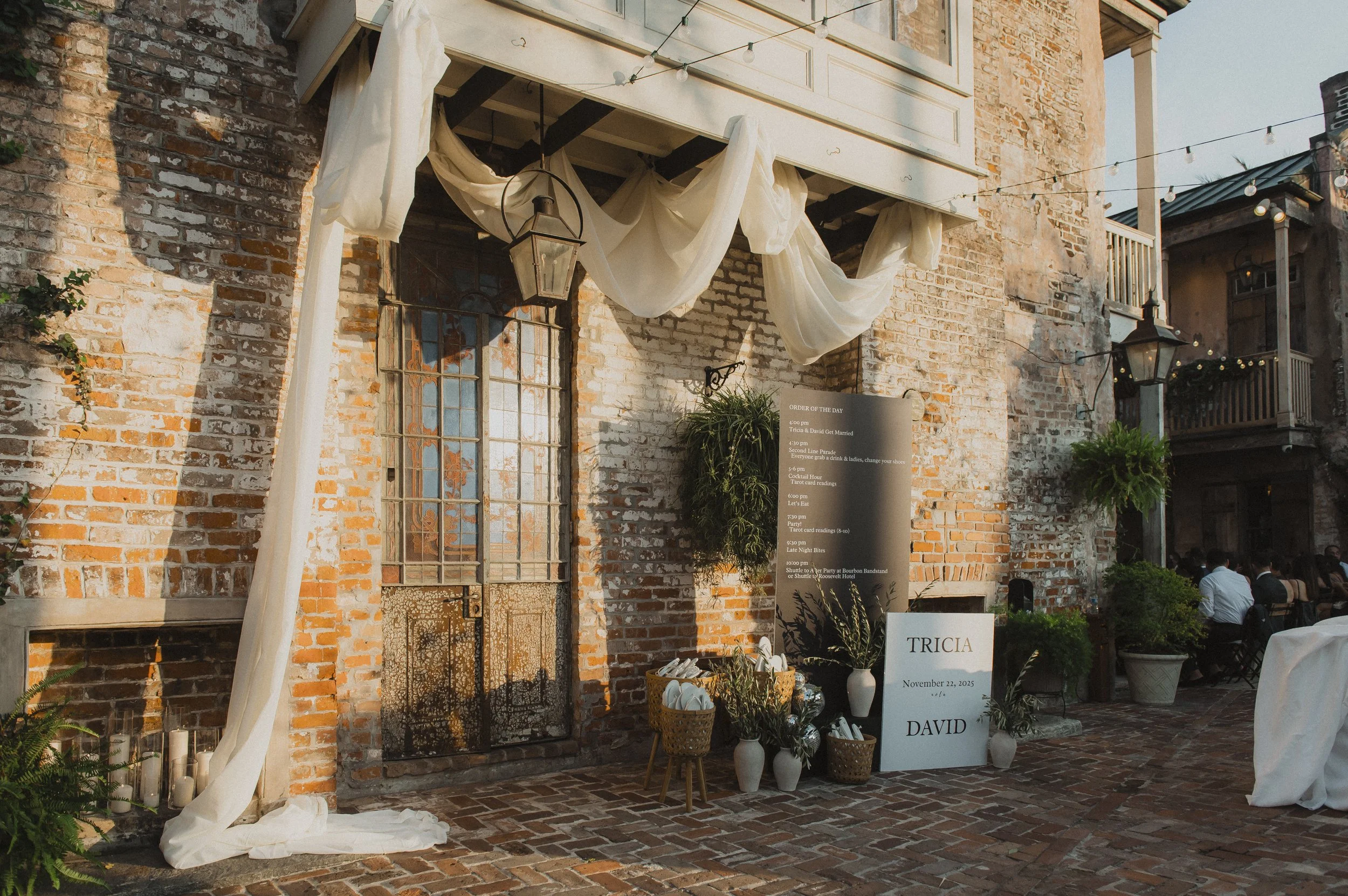 Historic brick exterior and balcony at Race + Religious