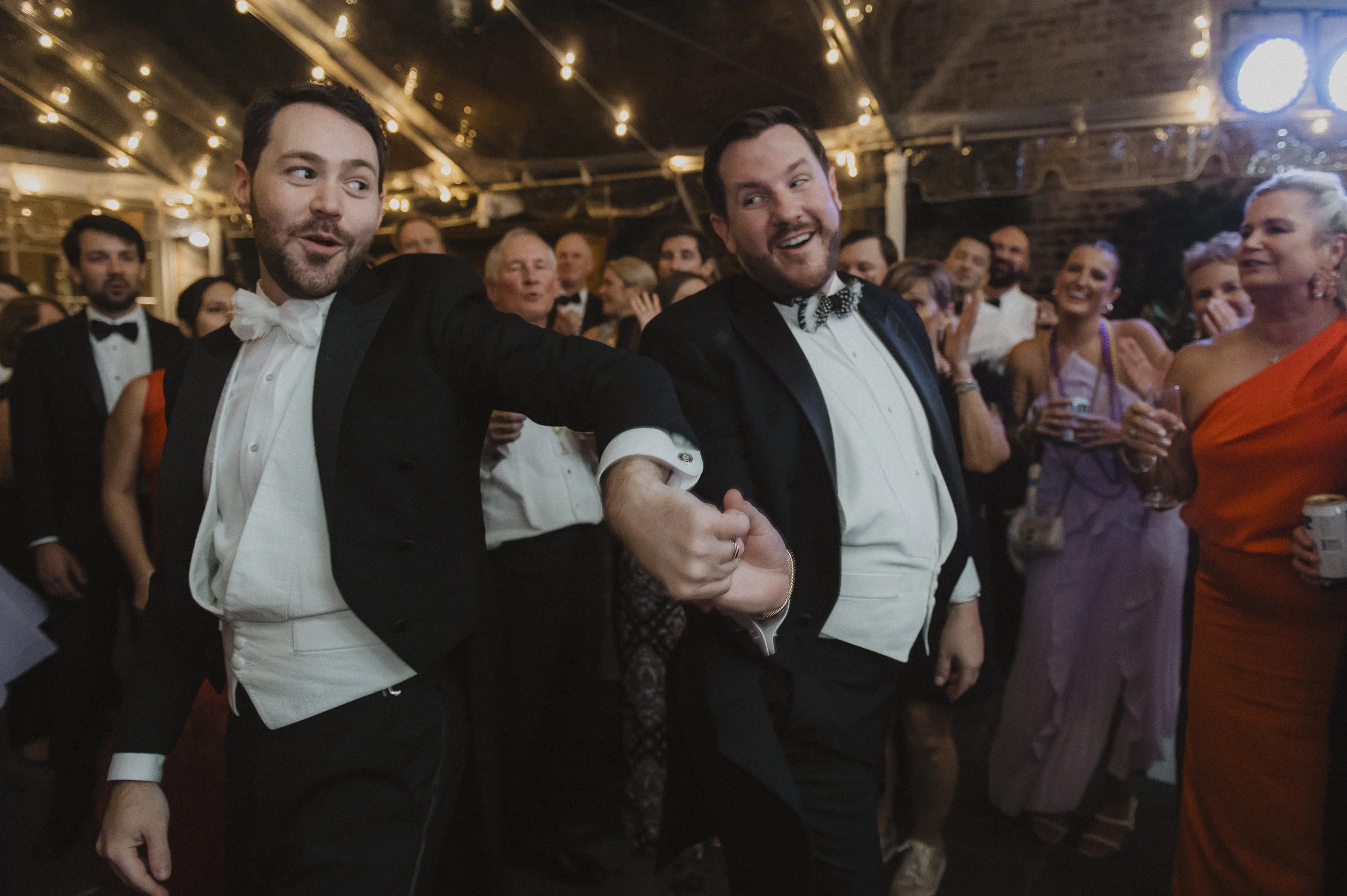 two grooms dancing at wedding broussards new orleans swanson photography