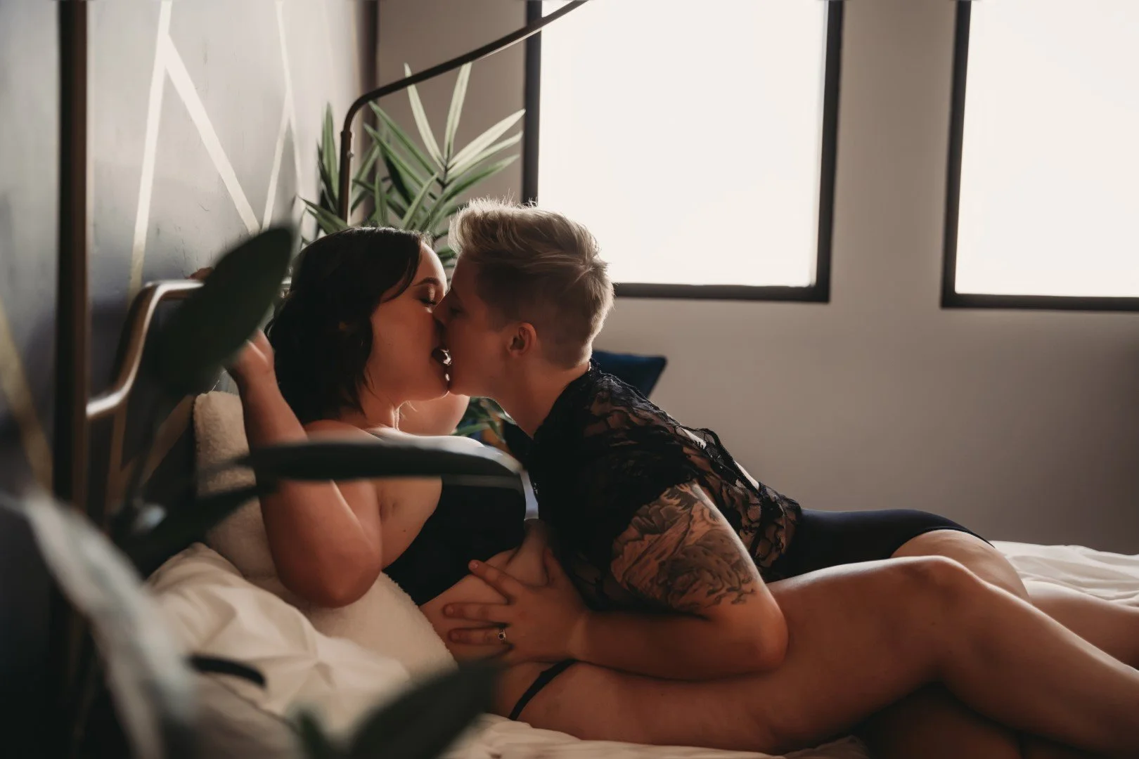 couples-boudoir-photographer-tucson-kissing-window-light-03.jpg