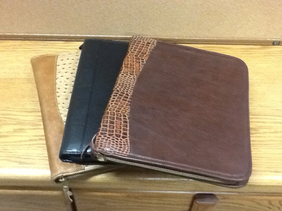 Handcrafted all leather portfolios that accomodate the PadStand or Ipal case.
