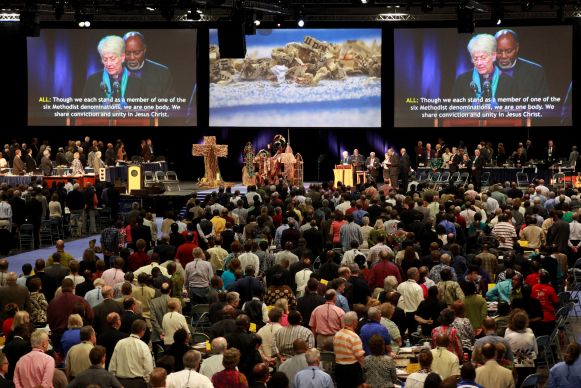 Delegates and visitors at the 2012 United Methodist General Conference in Tampa, Florida. Bishop Sharon Zimmerman Rader and Bishop John White are on the screens. Photo credit: Kathleen Barry/UMNS