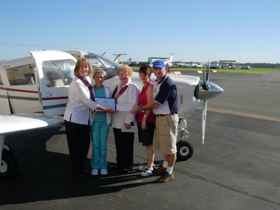 Donating to Angel Flight.jpg