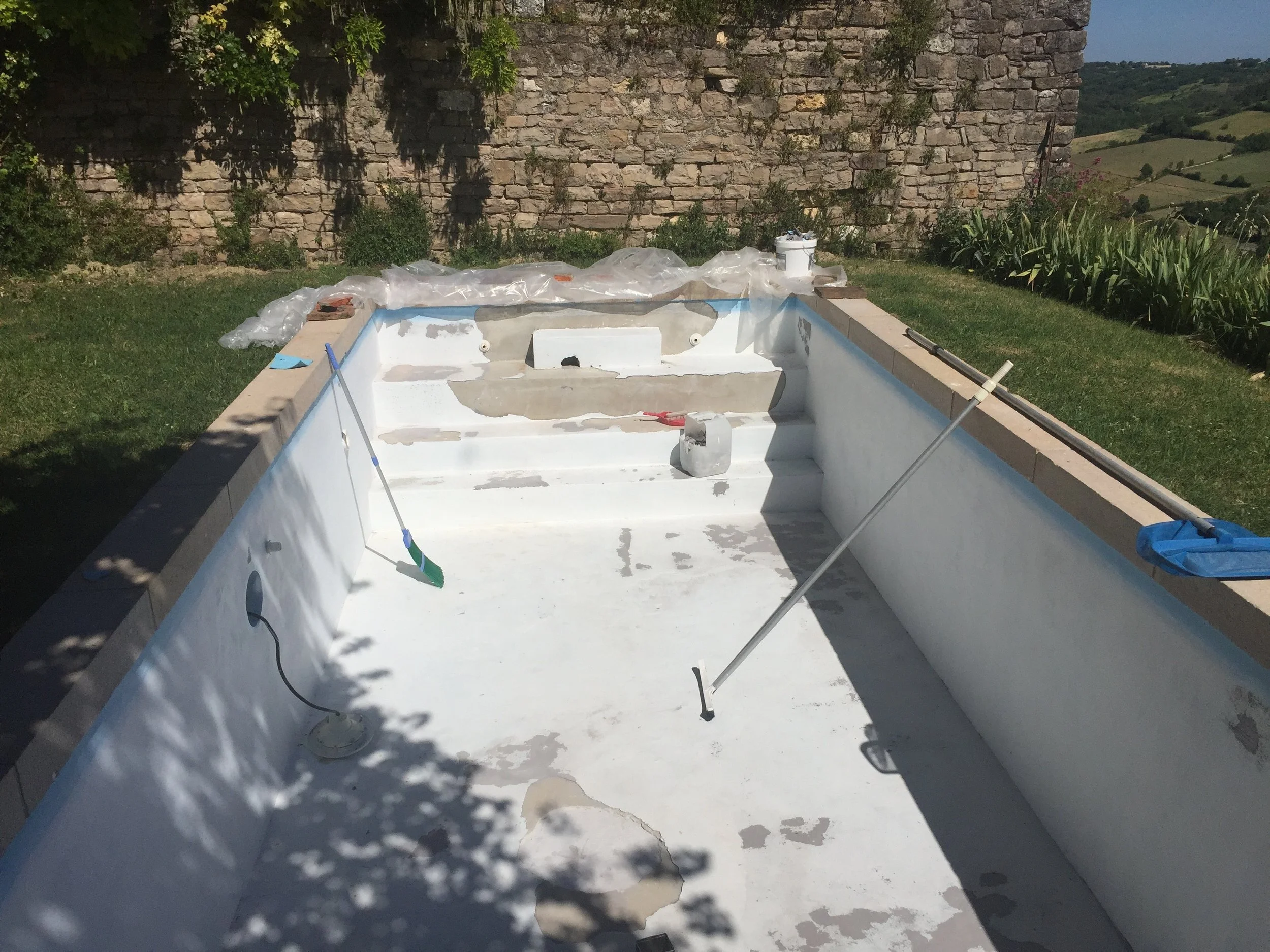 So once again, we drained the bloody pool, and once again re-rendered it. But then we figured not again, so lets get a liner! to hell with not understanding why this was happening.