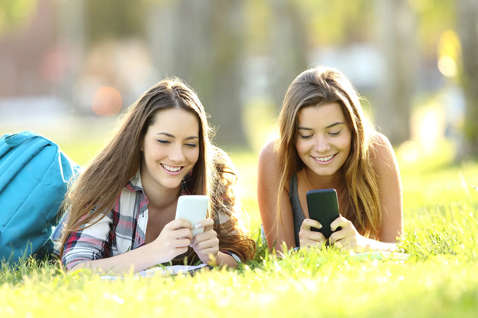 bigstock-Two-Students-Texting-In-Their--196020685.jpg