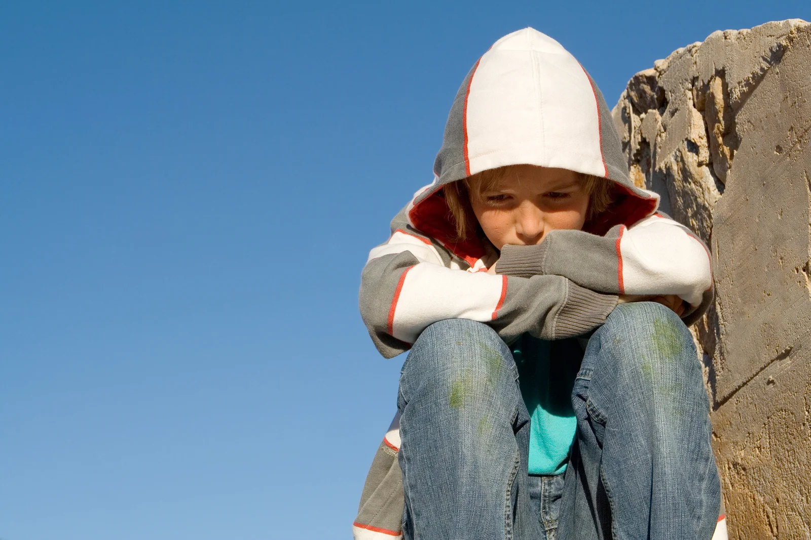 bigstock-Sad-Lonely-Child-Grieving-Alon-2738787.jpg