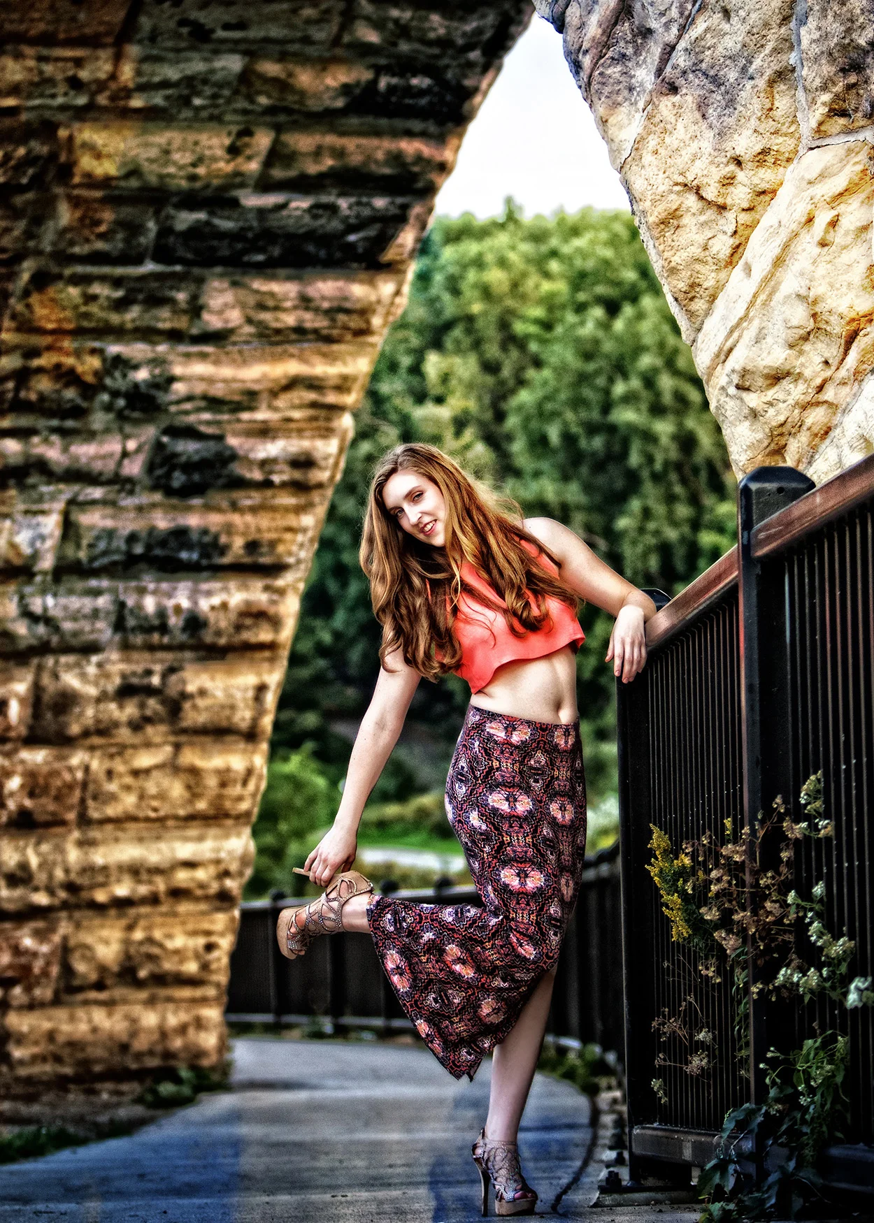 Senior under Stone Arch Bridge.