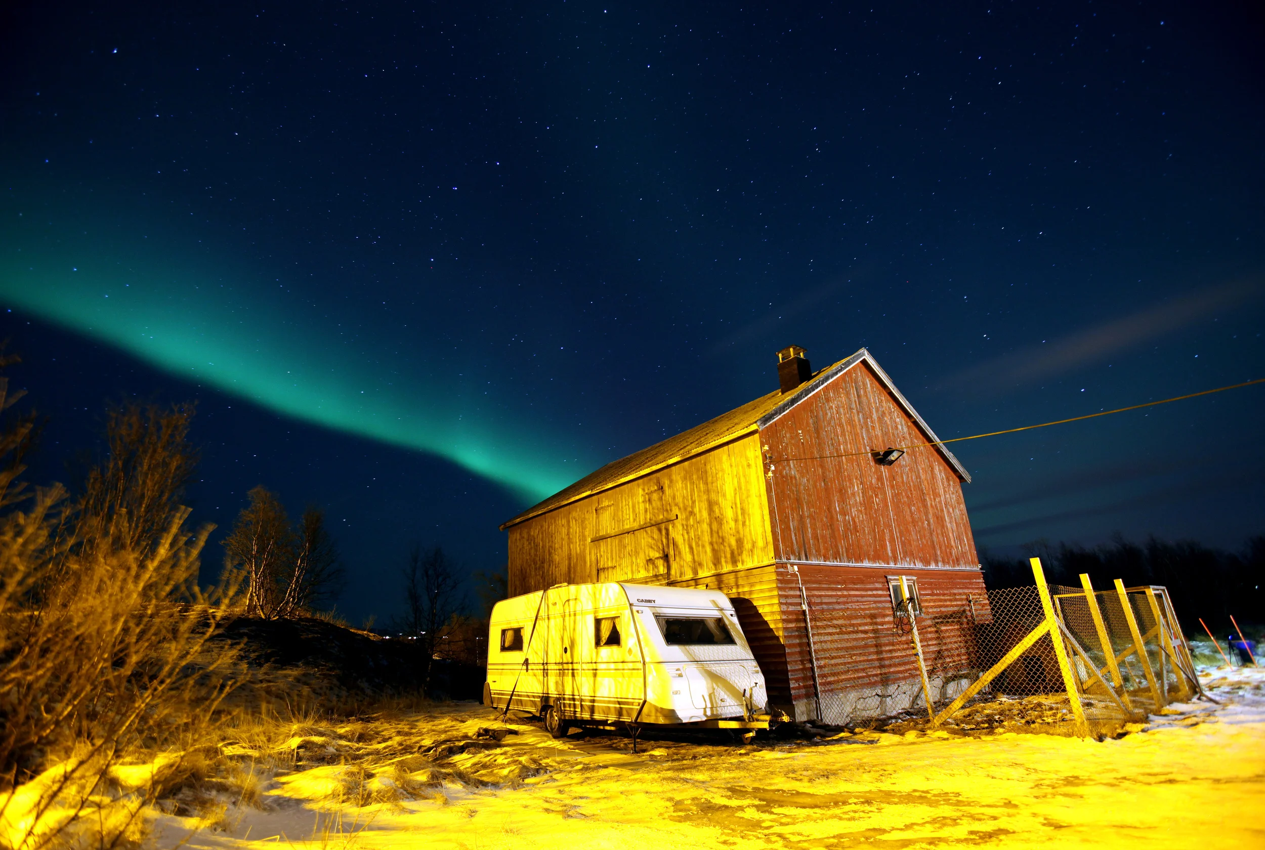  The Aurora Borealis, more commonly known as the Northern Lights, are seen near the town of Lakselv, at the mouth of the Porsanger Fjord, in Northern Norway. 