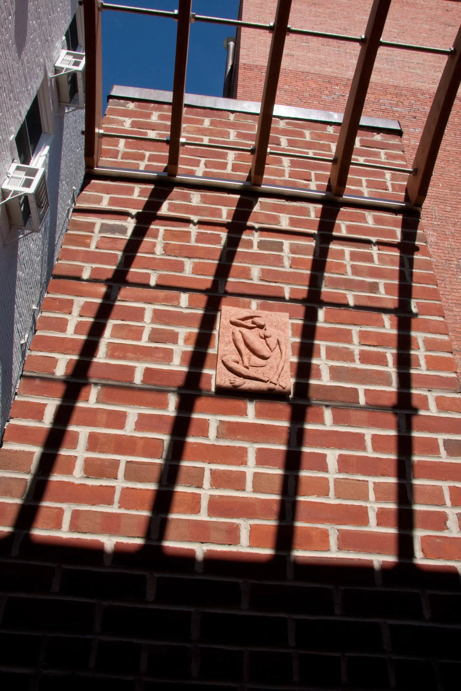 Project Location: Washington, DC (Logan Circle) Completion: Winter 2010 General Contractor: Redux Garden & Home Primary Material Palette: permeable clay pavers, black granite (fountain), antique granite (planters), ipe, river rock, stainless steel, aluminum sculptures, western red cedar trellis Photo By: George Brown