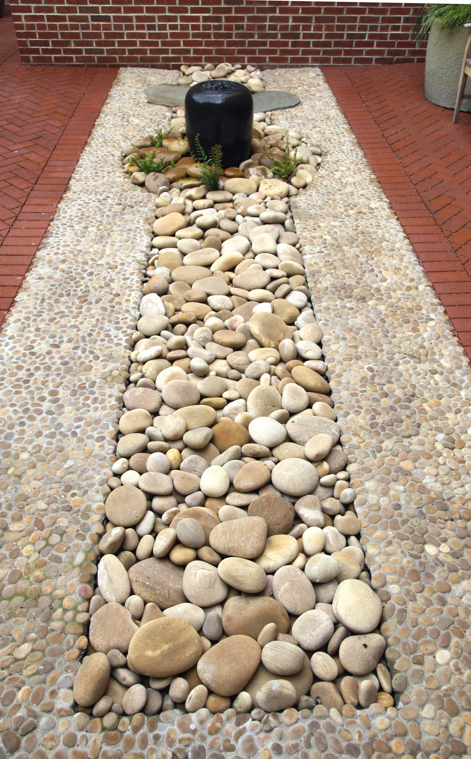 Project Location: Washington, DC (Logan Circle) Completion: Winter 2010 General Contractor: Redux Garden & Home Primary Material Palette: permeable clay pavers, black granite (fountain), antique granite (planters), ipe, river rock, stainless steel, aluminum sculptures, western red cedar trellis Photos By: Moody Landscape Architecture