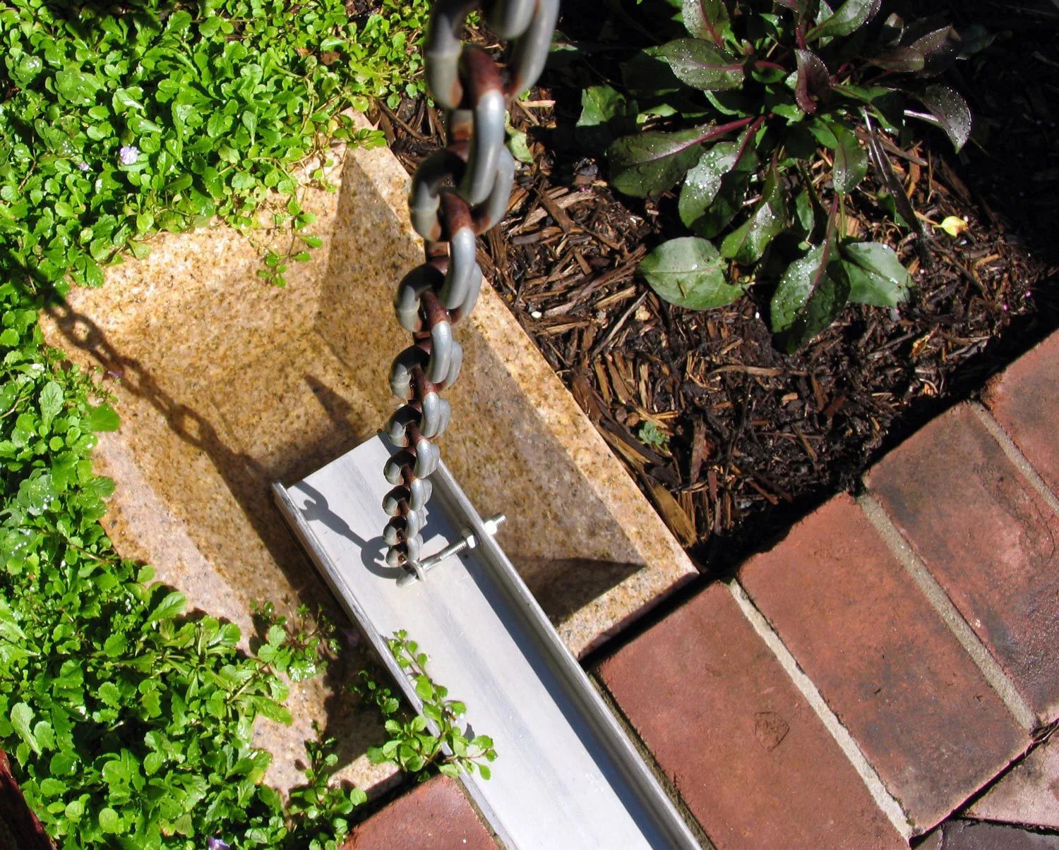 Project Location: Washington, DC (Capitol Hill) Completion: Spring 2010 General Contractor: Zen & Associates Primary Material Palette: golden dune granite, brick, western red cedar, aluminum, stainless steel, polycarbonate tubes, cast concrete (fountain and planter) Photos By: Moody Landscape Architecture