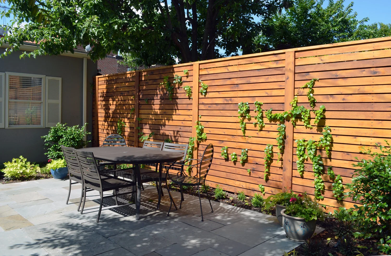 Project Location: Washington, DC (Capitol Hill) Project Type: Single Family Residential Completion: Spring 2013 General Contractor: Till Gardens Primary Material Palette: full range natural cleft bluestone, mahogany, western red cedar Photos By: Moody Landscape Architecture