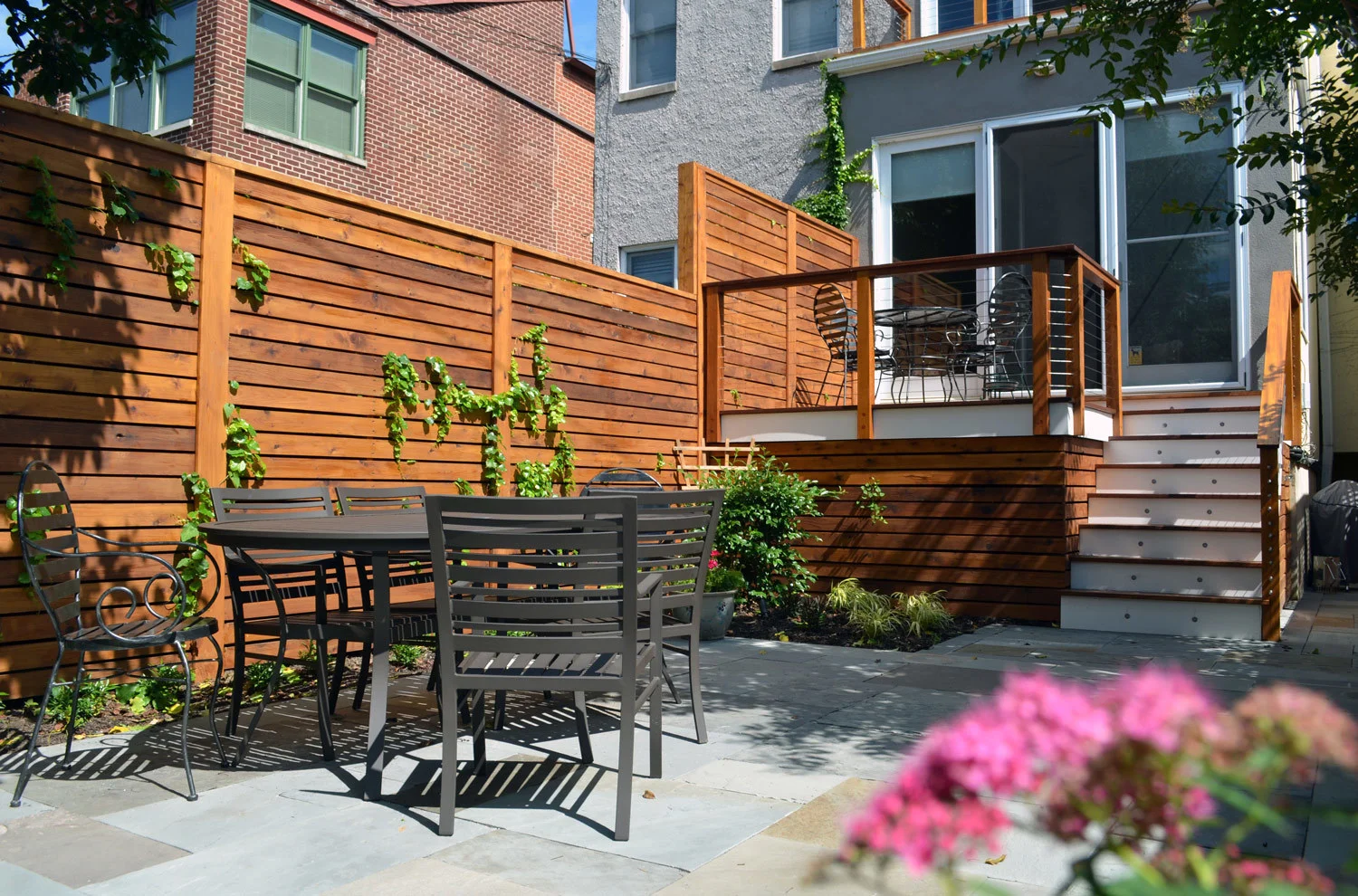 Project Location: Washington, DC (Capitol Hill) Project Type: Single Family Residential Completion: Spring 2013 General Contractor: Till Gardens Primary Material Palette: full range natural cleft bluestone, mahogany, western red cedar Photos By: Moody Landscape Architecture