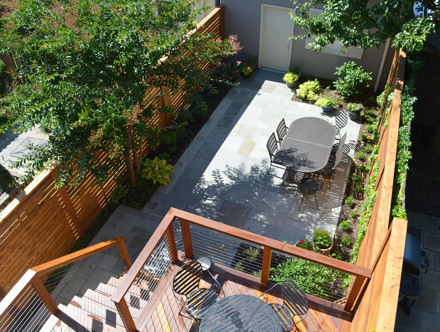Project Location: Washington, DC (Capitol Hill) Project Type: Single Family Residential Completion: Spring 2013 General Contractor: Till Gardens Primary Material Palette: full range natural cleft bluestone, mahogany, western red cedar Photos By: Moody Landscape Architecture