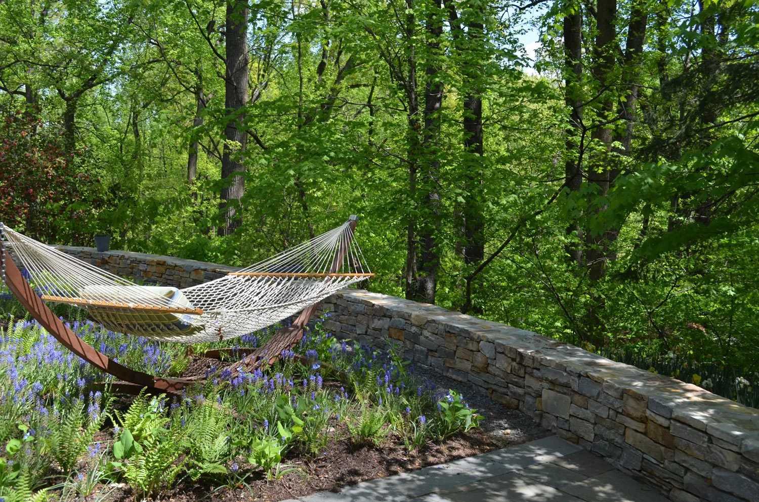 Project Location: Arlington, VA Completion: Spring 2012 General Contractor: Redux Garden & Home Primary Material Palette: full range natural cleft bluestone, select blue thermal finish bluestone, Maryland fieldstone, Bull Run brown and tan stone Photos By: Moody Landscape Architecture (unless noted otherwise)