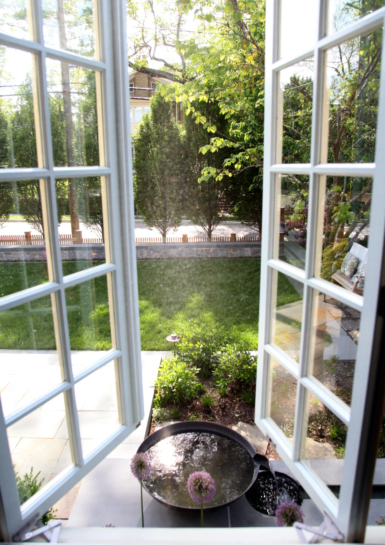 Project Location: Washington, DC (Chevy Chase) Completion: Fall 2013 General Contractor: Redux Garden & Home Project Architect: E/L Studio (garage design) Primary Material Palette: granite cobblestones, bluestone, Port Deposit granite, western red cedar, copper Photos By: Moody Landscape Architecture
