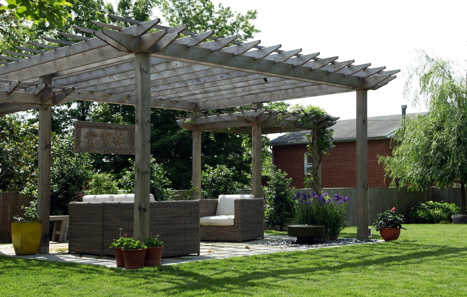 Project Location: Brookland, Washington DC Project Type: Single Family Residential Completion: Spring 2012 General Contractor: Redux Garden & Home Primary Material Palette: full range natural cleft bluestone, select blue thermal finish bluestone, western red cedar, antique millstone Photos By: Moody Landscape Architecture