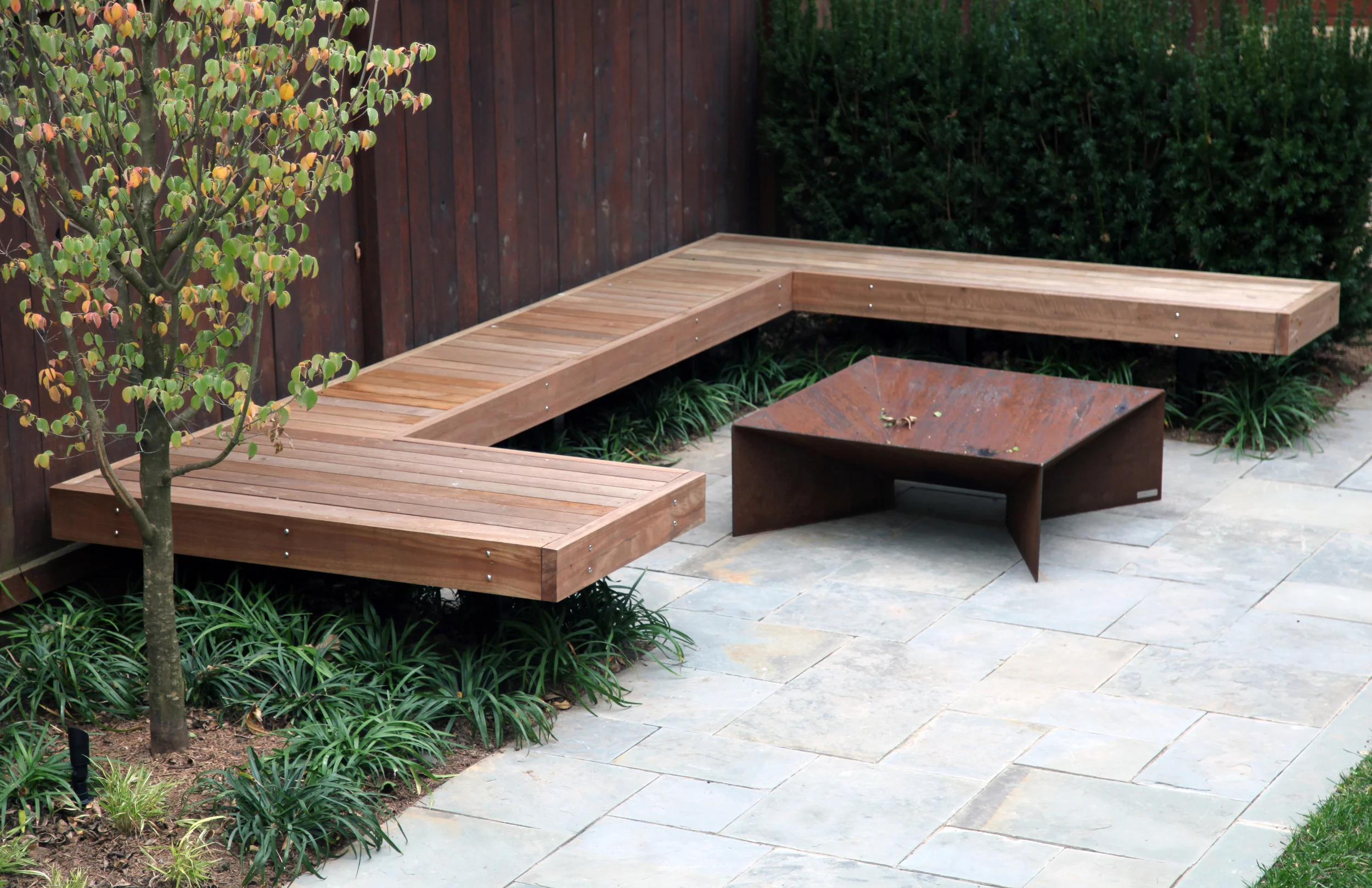 Project Location: Washington, DC (Capitol Hill) Completion: Fall 2014 General Contractor: Denchfield Landscaping Primary Material Palette: full range natural cleft bluestone, mahogany, corten steel Photos By: Moody Landscape Architecture (unless noted otherwise)