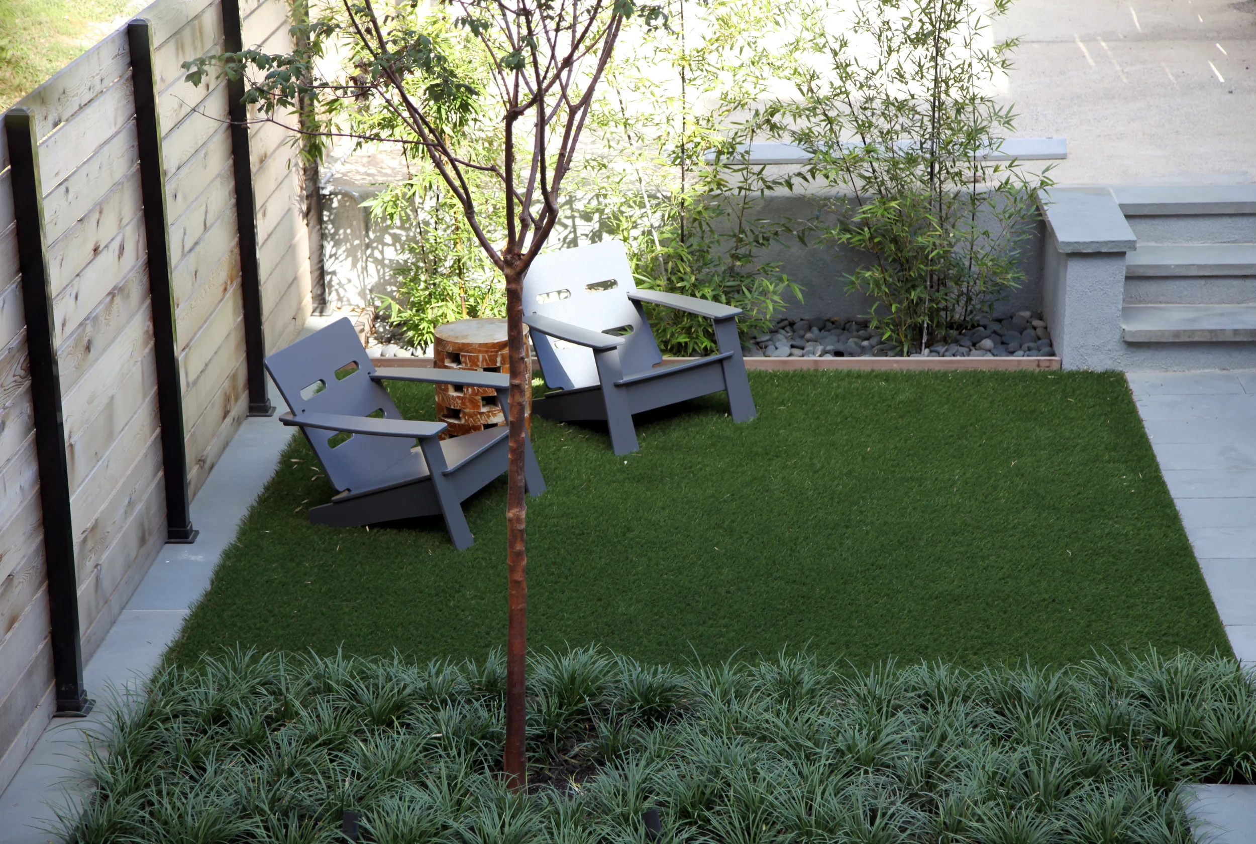 Project Location: Washington, DC (Columbia Heights) Completion: Spring 2015 General Contractor: Redux Garden & Home Primary Material Palette: thermal finish select blue bluestone, cedar, stucco concrete, synthetic turf, ipe Photos By: Moody Landscape Architecture